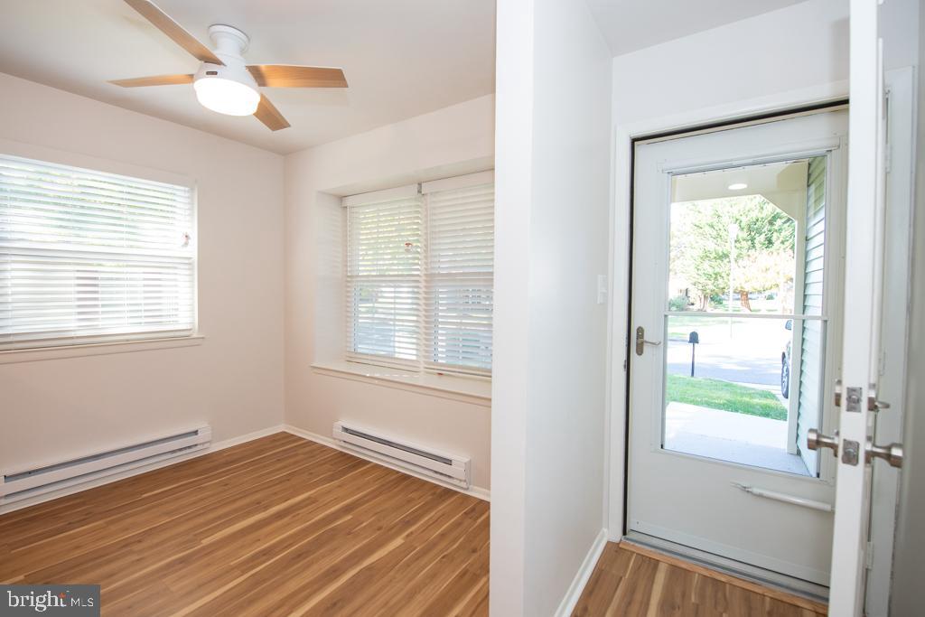 7066 Basswood Road Frederick, MD 21703 - Photo 4 of 19 Bright and inviting entry way and dining area