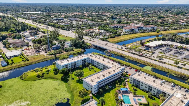 an aerial view of a house with a garden