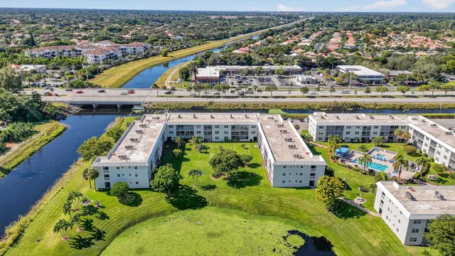 a view of a swimming pool with a garden