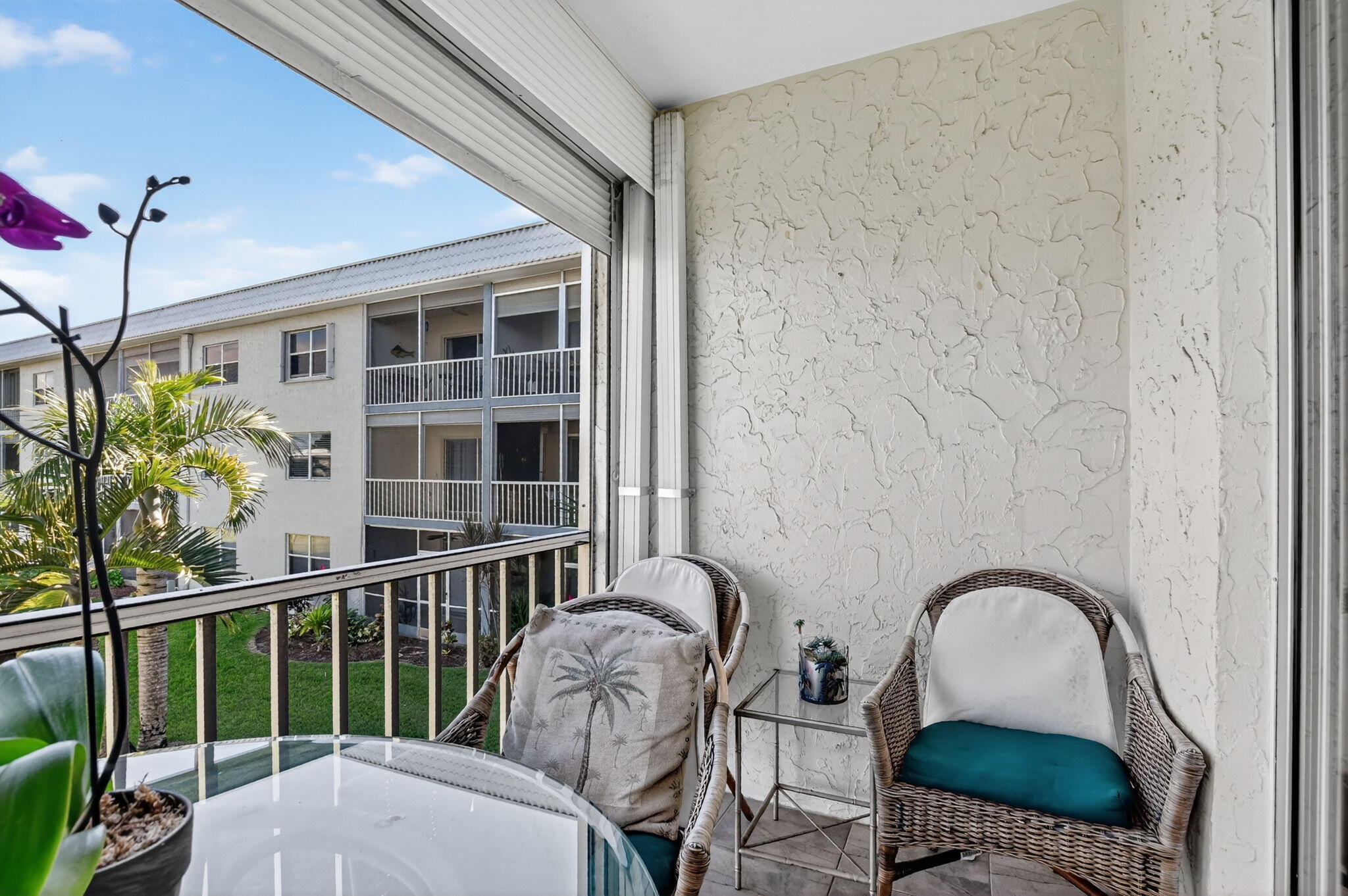 9880 Marina Boulevard, Unit 1522 Boca Raton, FL 33428 - Photo 49 of 52 a front view of a house with garden