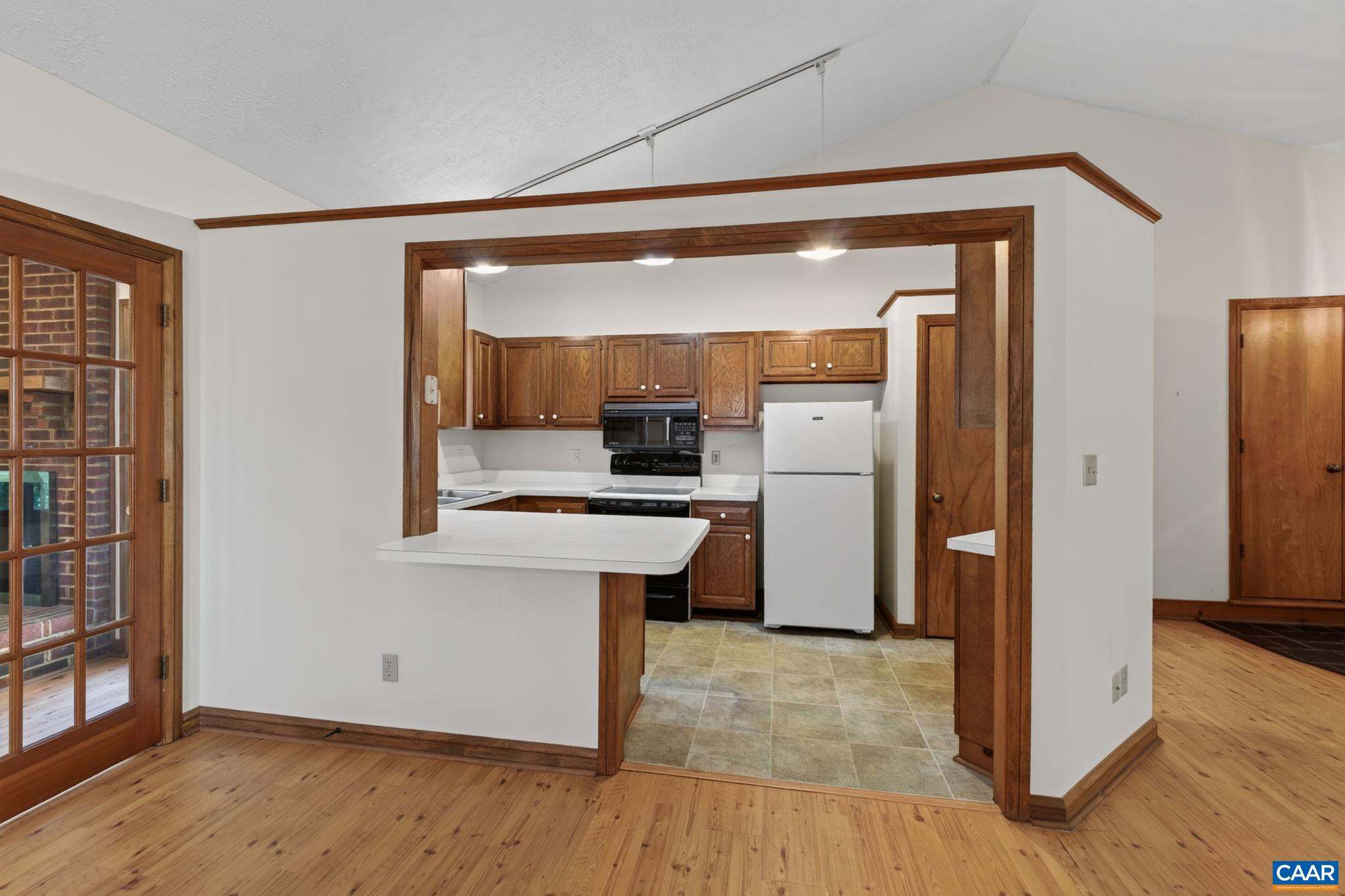 9 Timberlake Terrace Palmyra, VA 22963 - Photo 7 of 35 a kitchen with a refrigerator and a sink