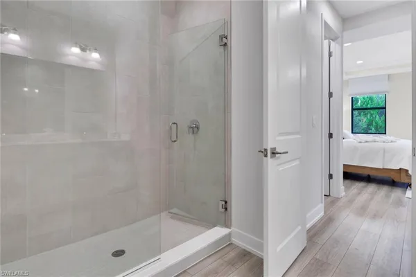 a bedroom with a bed and a cabinets