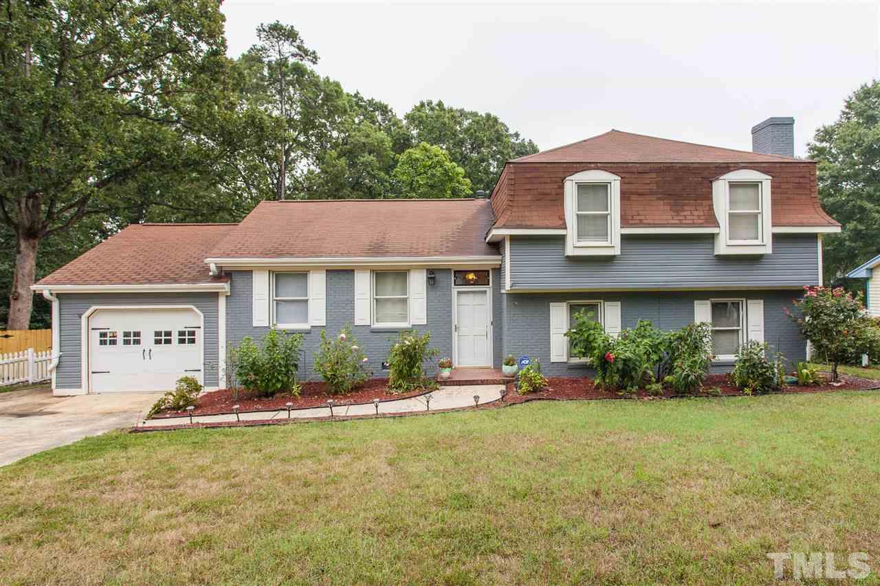 337 East Millbrook Road Raleigh, NC 27609 - Photo 1 of 30 a front view of a house with a yard