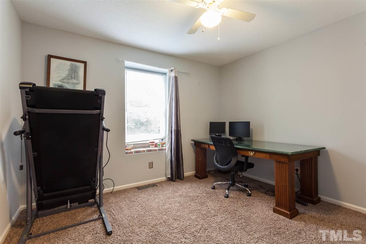 337 East Millbrook Road Raleigh, NC 27609 - Photo 14 of 30 a view of a workspace with furniture and a window