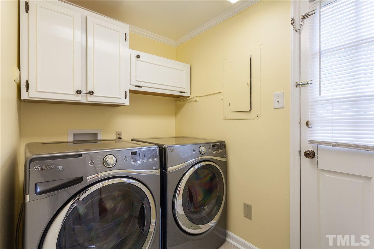 337 East Millbrook Road Raleigh, NC 27609 - Photo 22 of 30 a utility room with dryer and washer