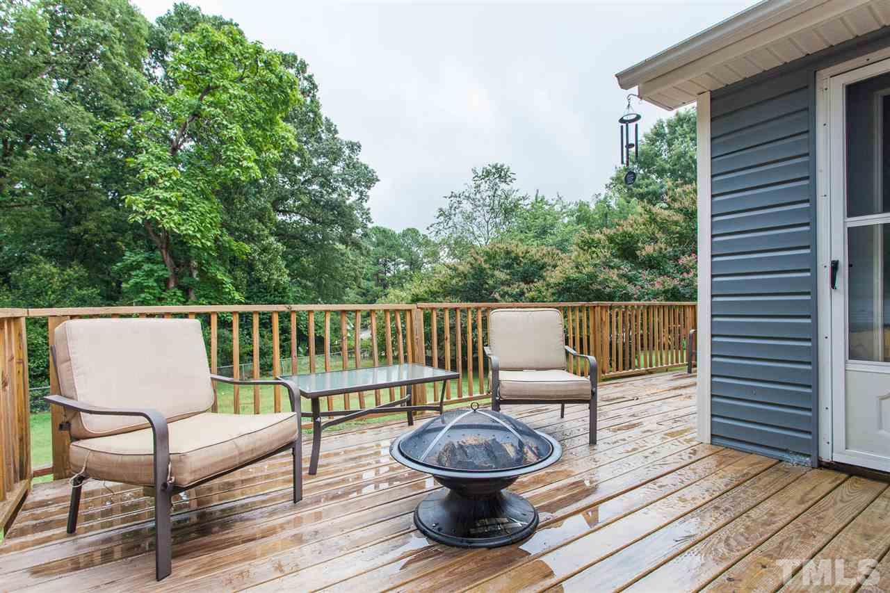 337 East Millbrook Road Raleigh, NC 27609 - Photo 23 of 30 a view of a chair and tables