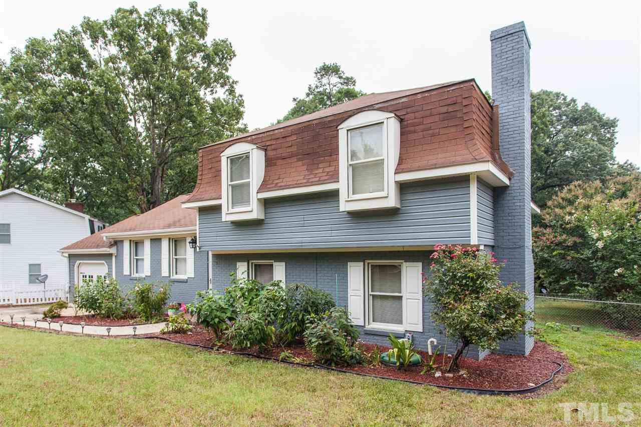 337 East Millbrook Road Raleigh, NC 27609 - Photo 29 of 30 a front view of a house with a yard