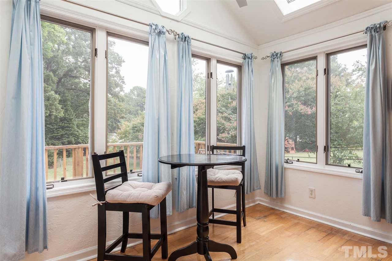 337 East Millbrook Road Raleigh, NC 27609 - Photo 6 of 30 a dining room with furniture and window