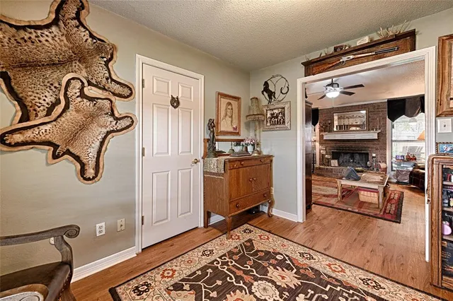 a room with furniture and a book shelf