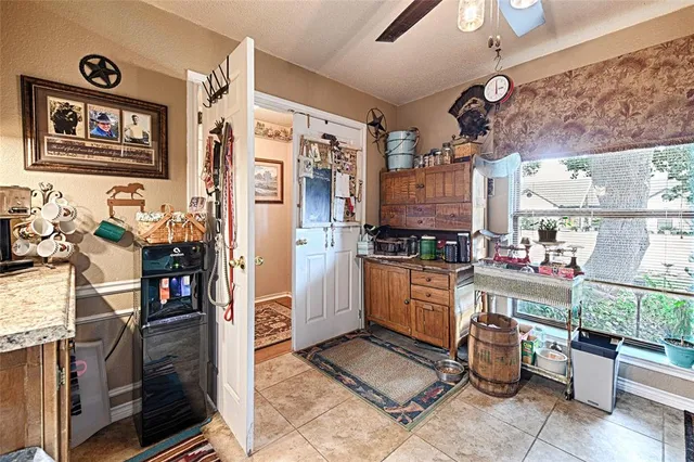 a view of a workspace with bookshelf