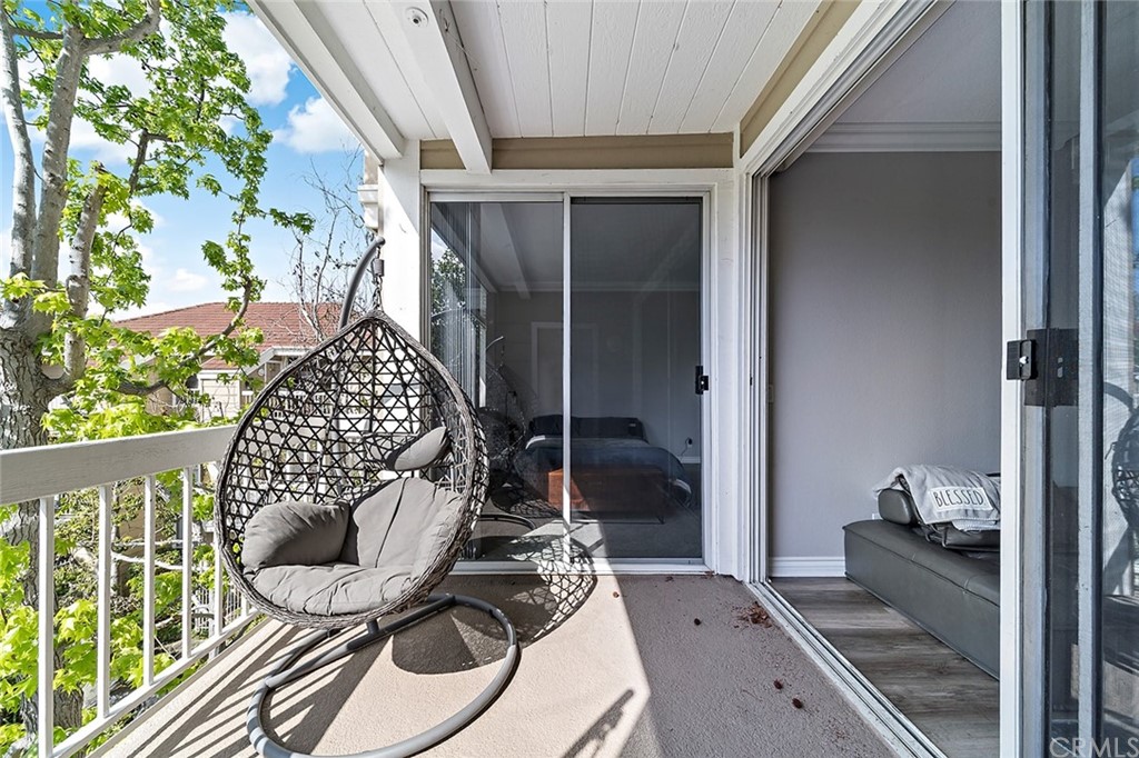 20301 Bluffside Circle, Unit 304 Huntington Beach, CA 92646 - Photo 22 of 40 a balcony view with a potted plant