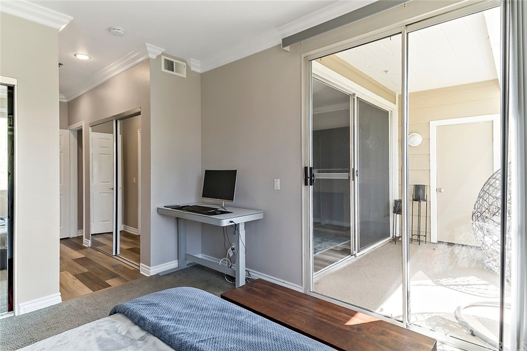 20301 Bluffside Circle, Unit 304 Huntington Beach, CA 92646 - Photo 27 of 40 a workspace with furniture and window