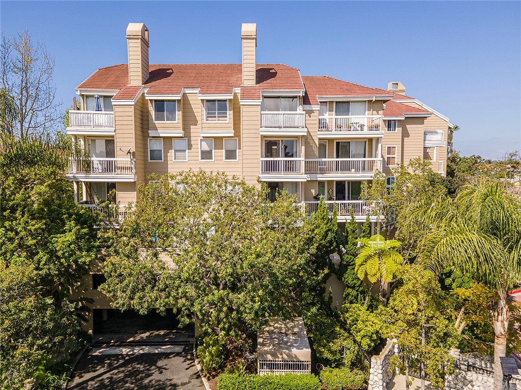 20301 Bluffside Circle, Unit 304 Huntington Beach, CA 92646 - Photo 3 of 40 front view of a building