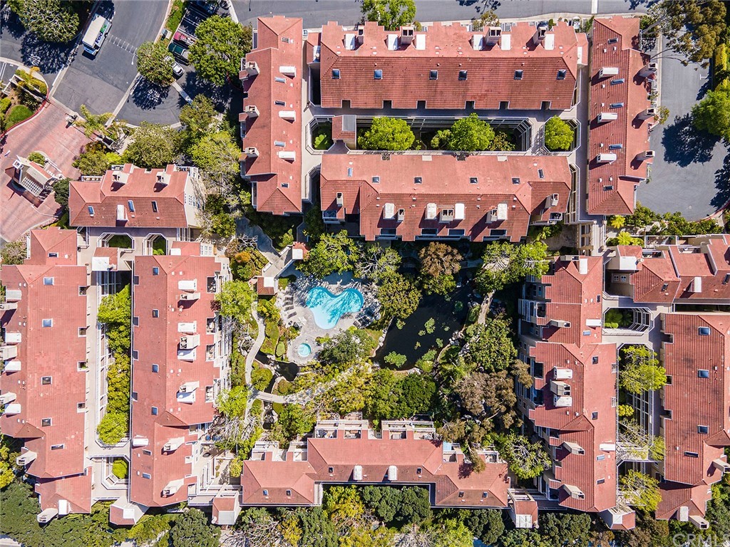 20301 Bluffside Circle, Unit 304 Huntington Beach, CA 92646 - Photo 39 of 40 an aerial view of residential houses with outdoor space and parking