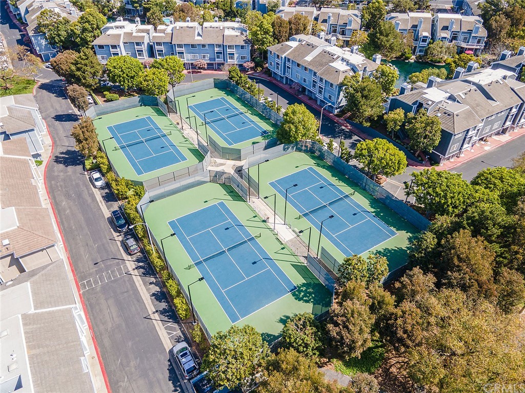 20301 Bluffside Circle, Unit 304 Huntington Beach, CA 92646 - Photo 40 of 40 an aerial view of multiple houses with yard