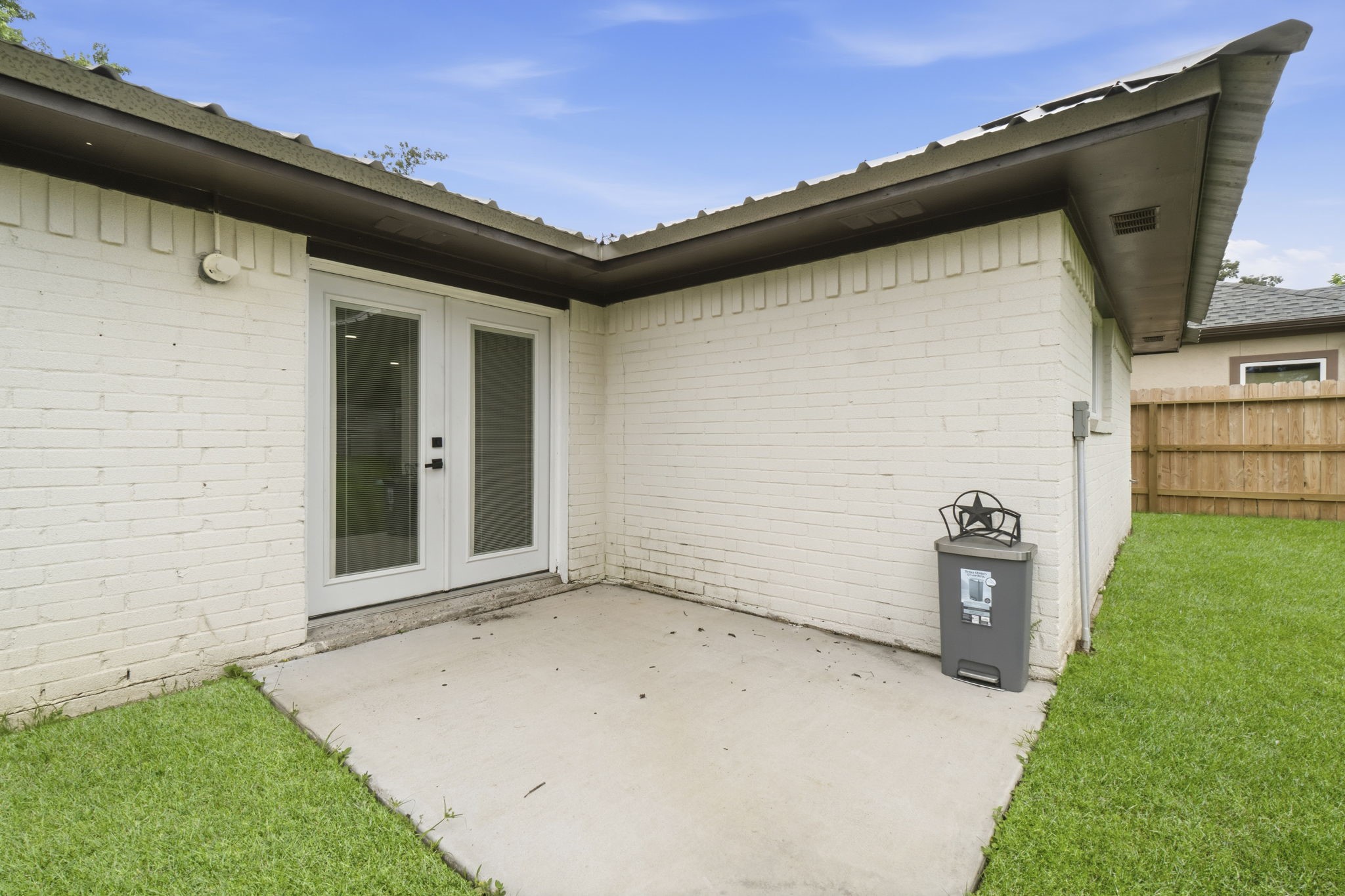 14850 Coaltown Road Willis, TX 77378 - Photo 28 of 41 Private patio area with easy access to the home, perfect for outdoor dining, grilling, or relaxing evenings.