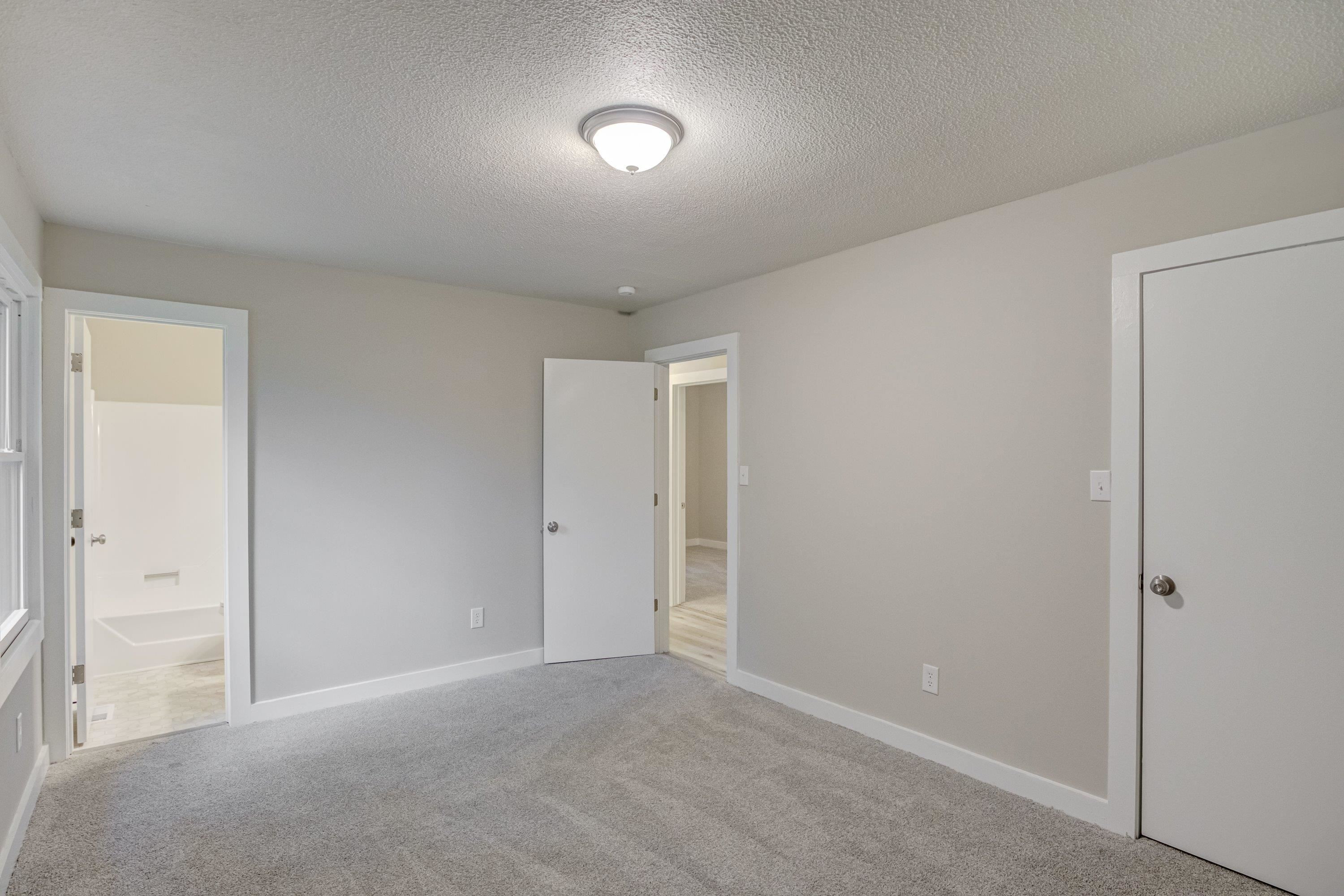 5404 Pear Orchard Lane Raleigh, NC 27616 - Photo 11 of 22 a view of an empty room and a window