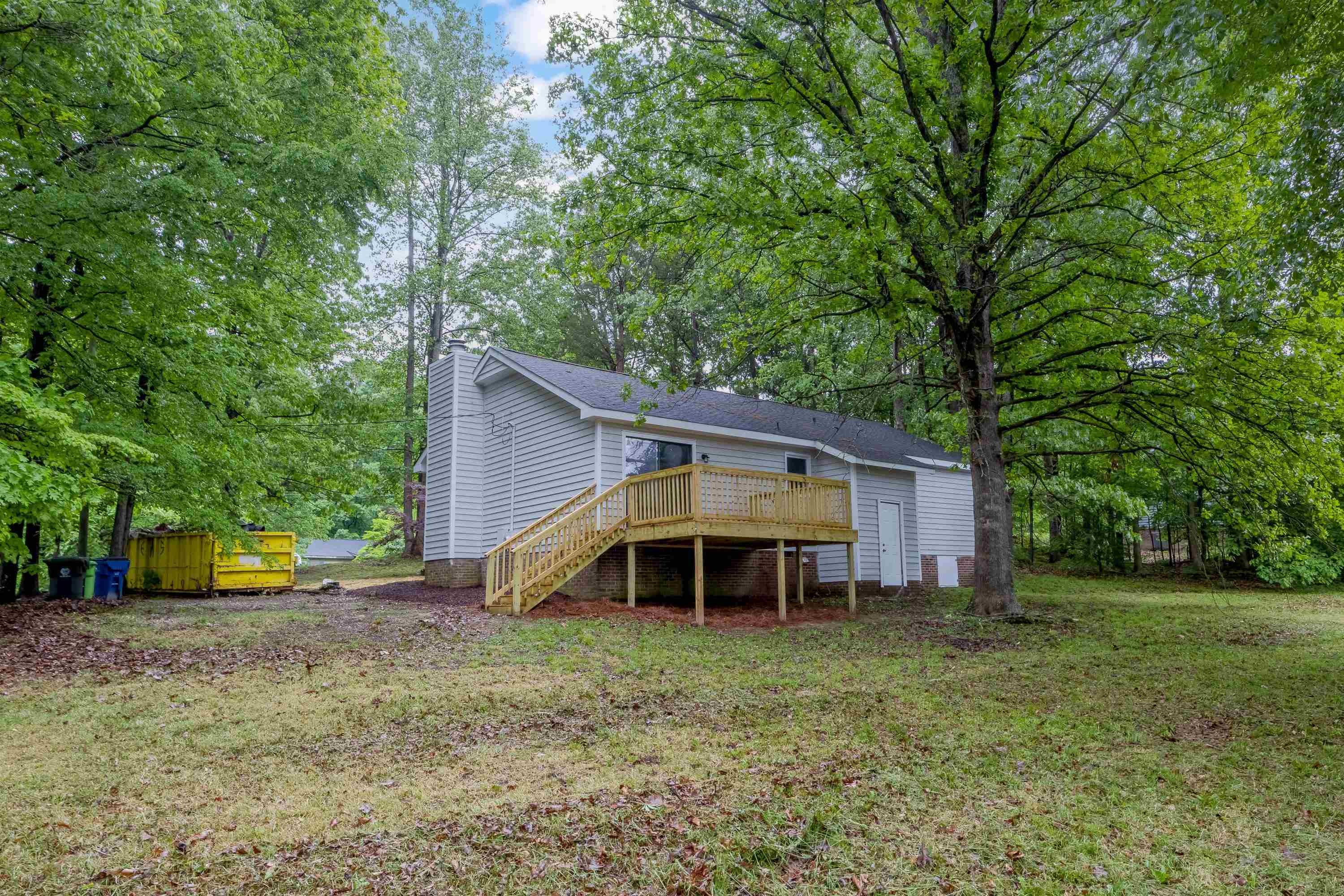 5404 Pear Orchard Lane Raleigh, NC 27616 - Photo 20 of 22 a front view of a house with garden