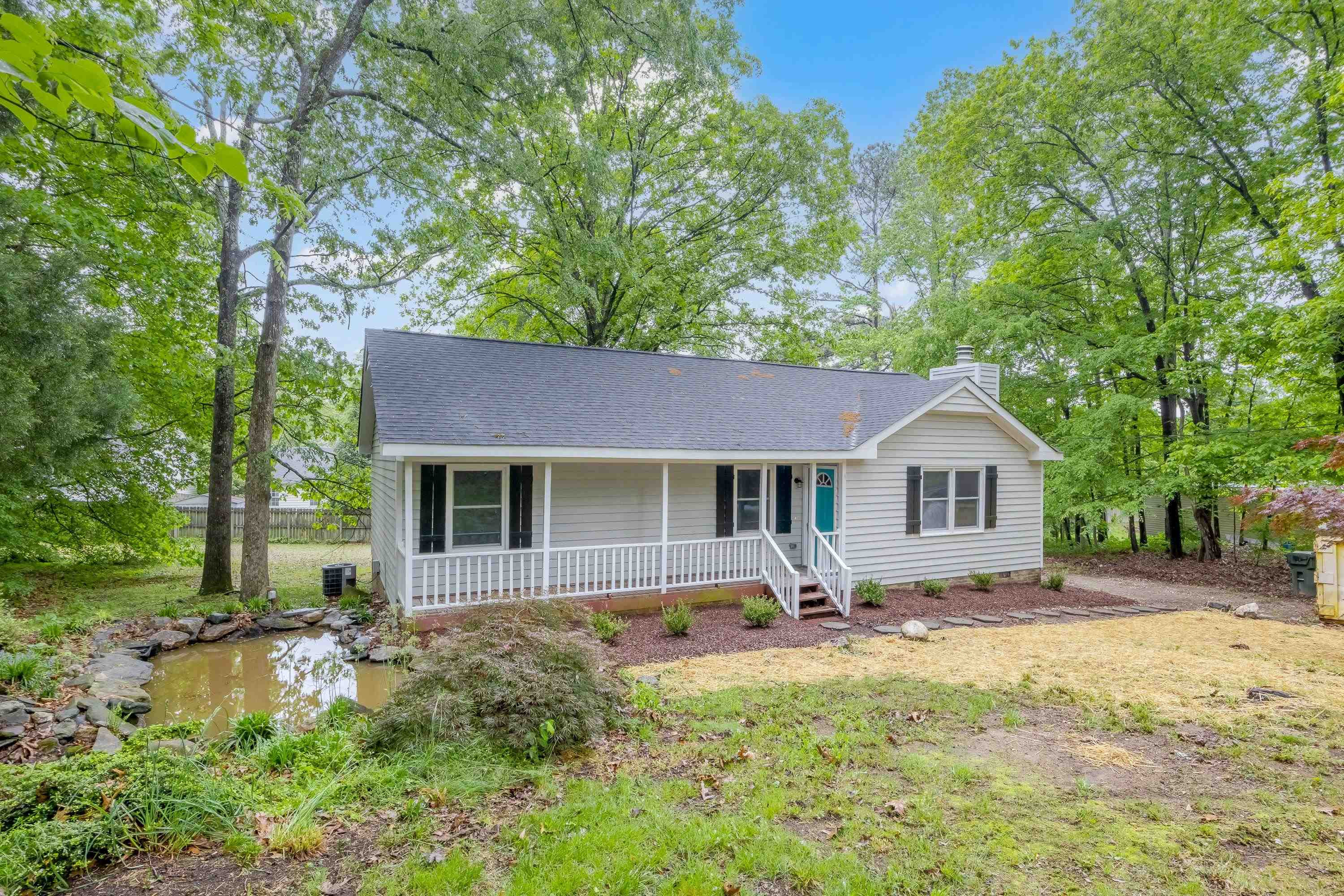 5404 Pear Orchard Lane Raleigh, NC 27616 - Photo 2 of 22 a house view with a garden space