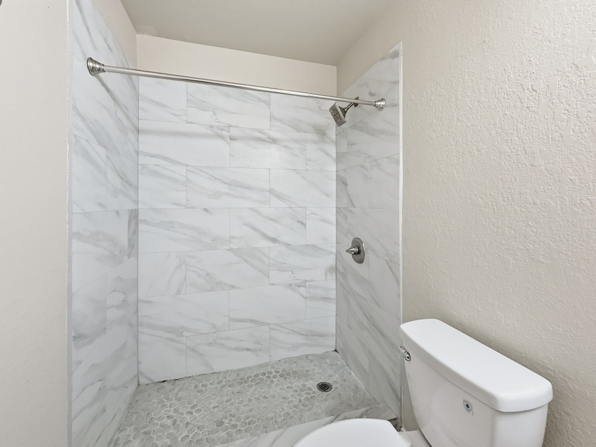 29502 Legends Pine Lane Spring, TX 77386 - Photo 12 of 15 a bathroom with a shower and toilet