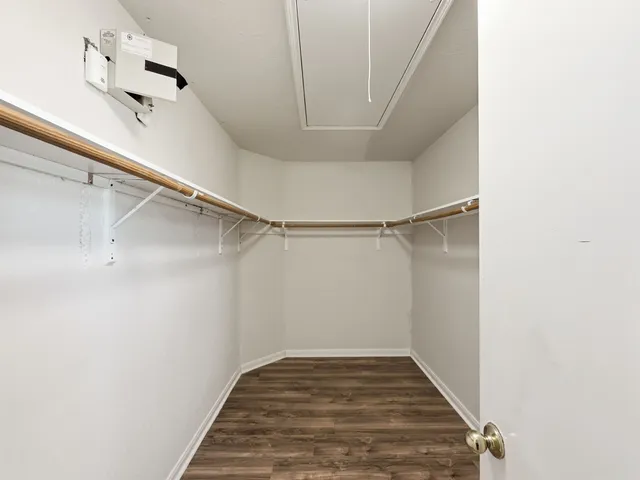 a view of a room with racks on the wall