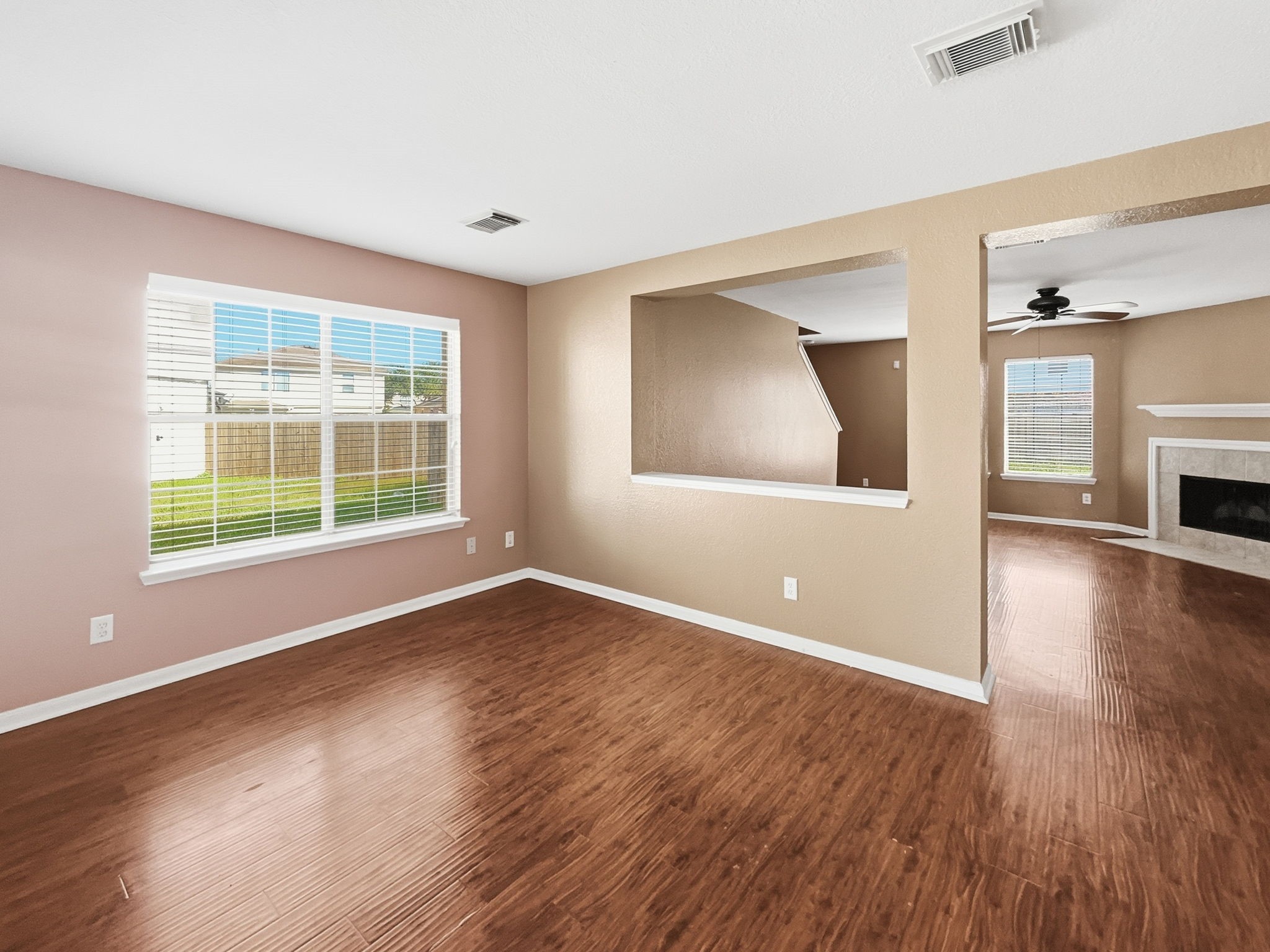 29502 Legends Pine Lane Spring, TX 77386 - Photo 2 of 15 an empty room with wooden floor and windows