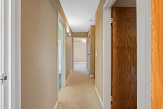 913 Valley Way Madera, CA 93637 - Photo 23 of 39 a view of a hallway with a dining room