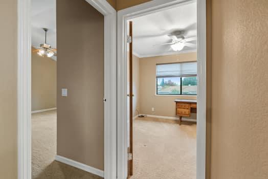 913 Valley Way Madera, CA 93637 - Photo 26 of 39 a view of a bathroom from a hallway