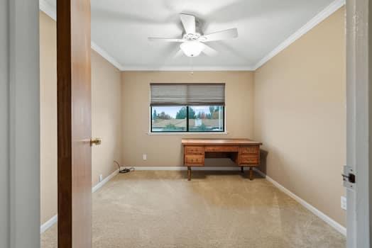 913 Valley Way Madera, CA 93637 - Photo 27 of 39 a bedroom with a bed and a window