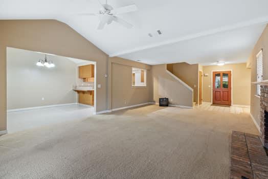 913 Valley Way Madera, CA 93637 - Photo 9 of 39 a view of a livingroom with a staircase
