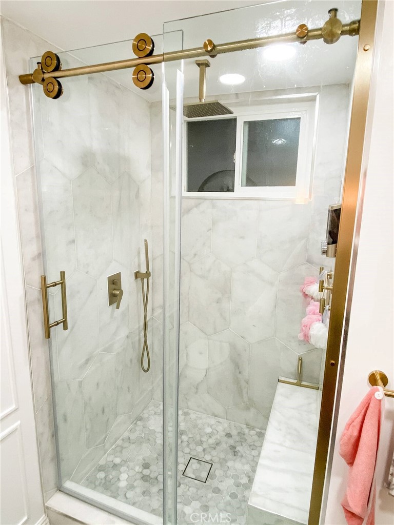 12280 Caladre Avenue Downey, CA 90242 - Photo 10 of 15 a bathroom with a shower