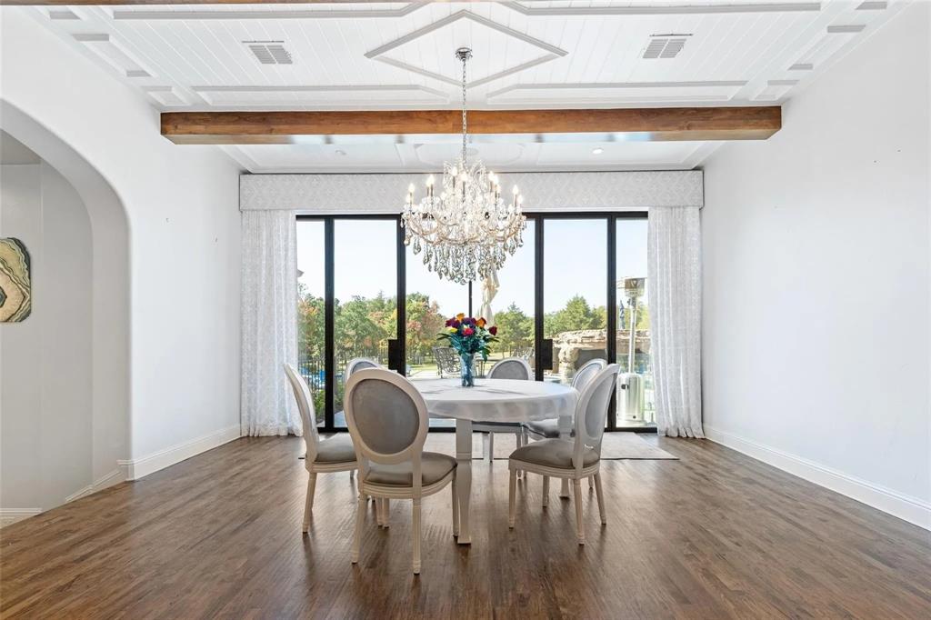 935 West Dove Road Southlake, TX 76092 - Photo 14 of 39 a view of a dining room with furniture window and wooden floor