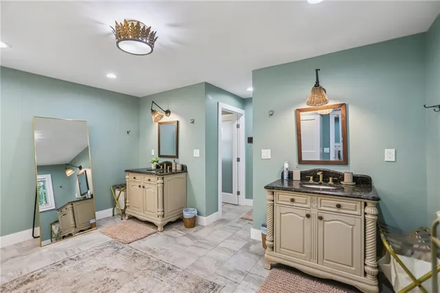 a kitchen with a stove and a wooden floors