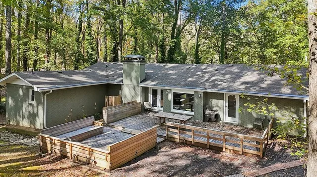 an outdoor space with lots of trees