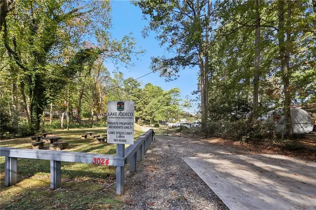 a view of a bench in a backyard