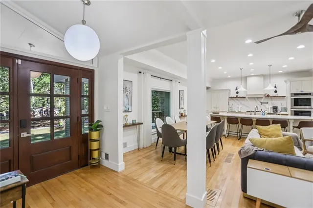 a view of a dining room with furniture window and outside view