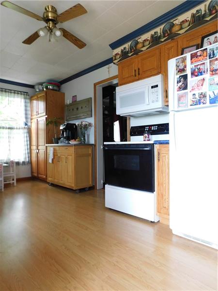 2003 Mercer Road Fredonia, PA 16124 - Photo 13 of 25 NEWER KITCHEN WITH PANTRY AND APPLIANCE PACKAGE