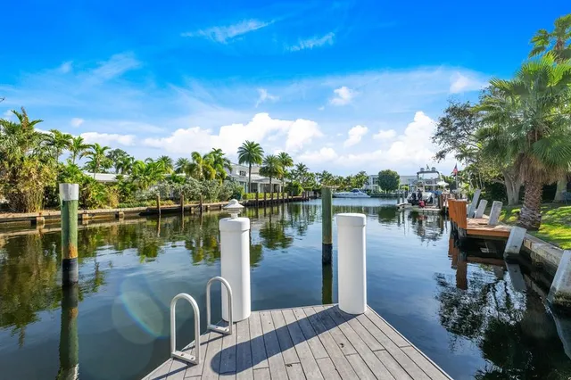 a kitchen with stainless steel appliances granite countertop a stove and a refrigerator