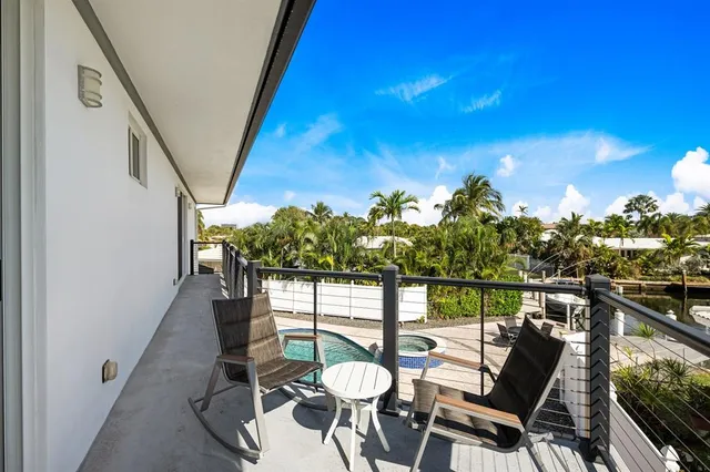 a view of a backyard with pathway