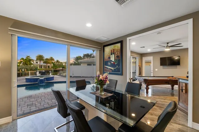 a view of a living room and bathroom