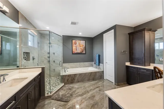 a bedroom with a bed and furniture