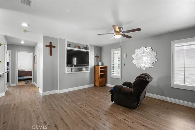 a view of a dining room with furniture and window