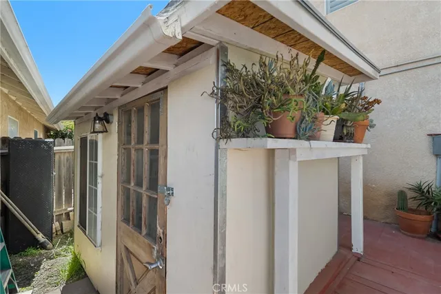 a kitchen that has a sink and a stove