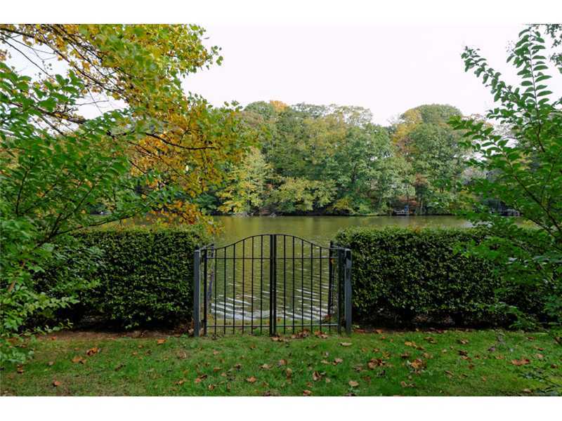 189 Valley Road Cos Cob, CT 06807 - Photo 3 of 17 a view of a garden from a lake