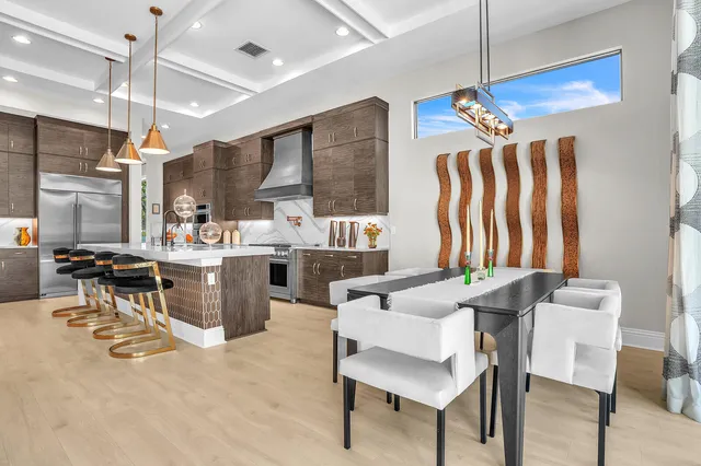 a view of a dining room with furniture window and outside view