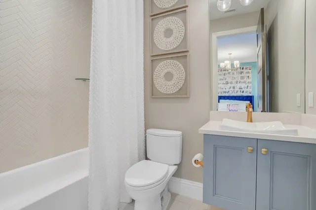 a view of a porch with furniture and a yard