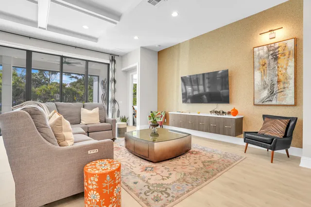 a kitchen with a dining table and chairs