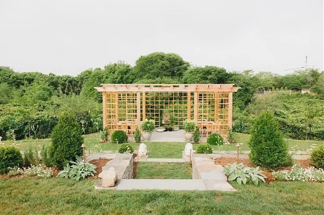 3 Wauwinet Road Nantucket, MA 02554 - Photo 16 of 32 a front view of a house with a yard