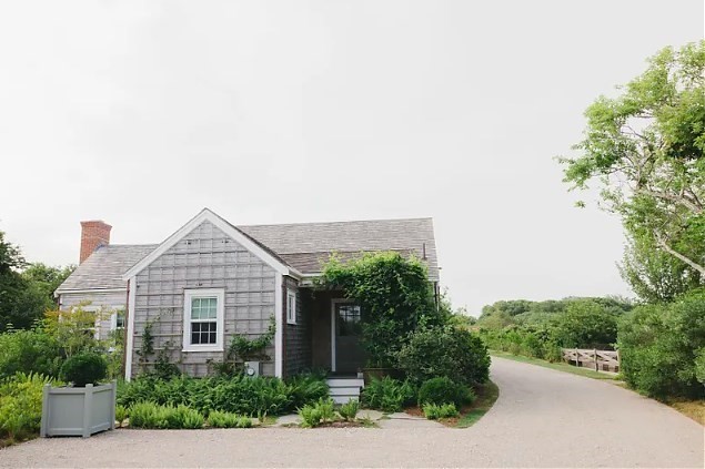 3 Wauwinet Road Nantucket, MA 02554 - Photo 24 of 32 a view of a house with a yard and plants