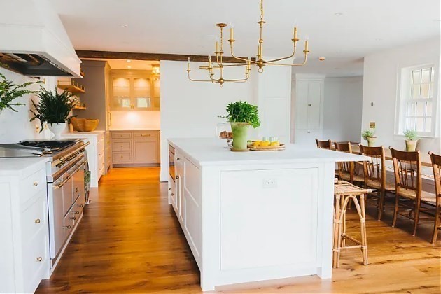 3 Wauwinet Road Nantucket, MA 02554 - Photo 5 of 32 a hallway with dining table and chairs